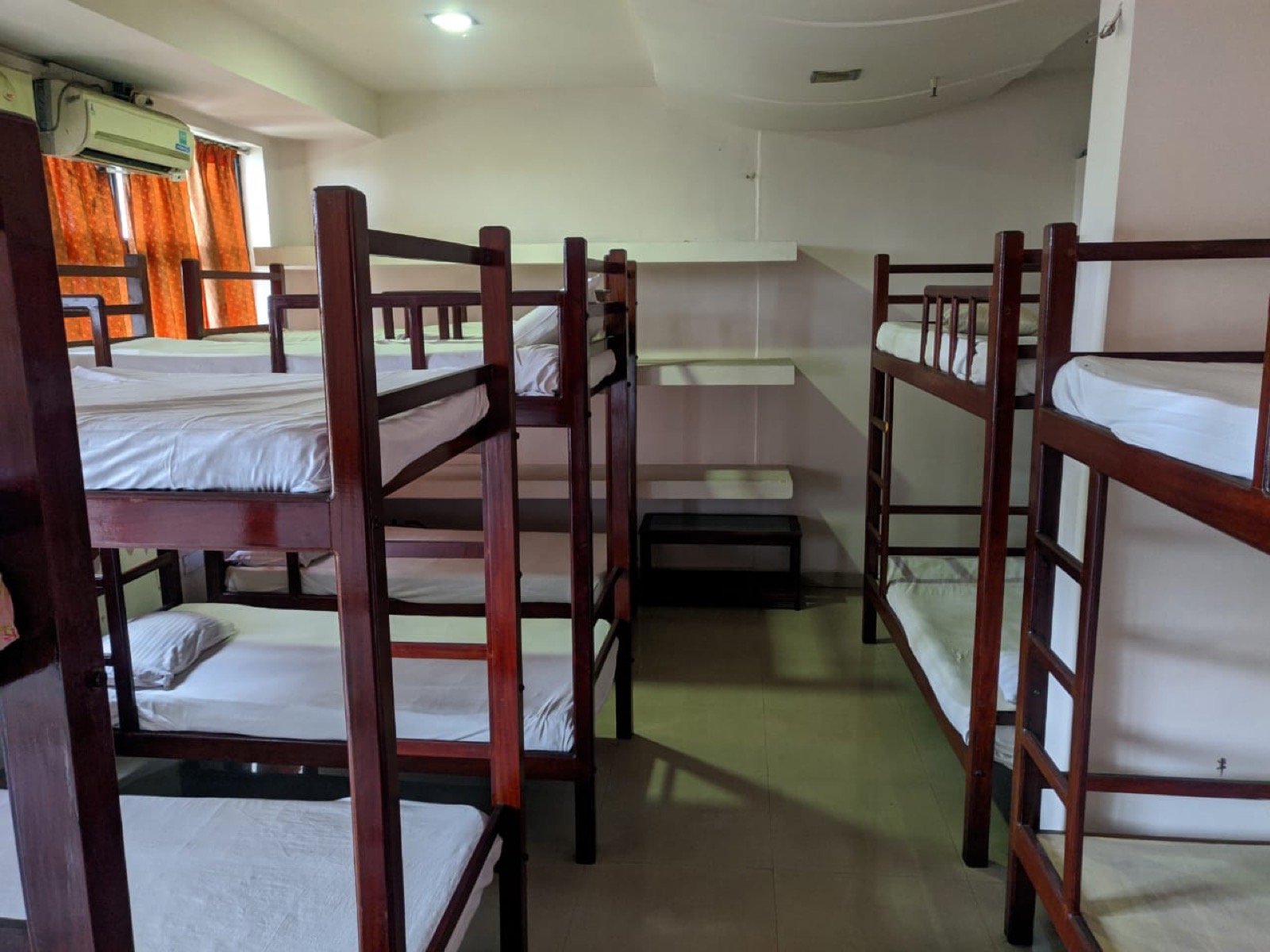 Dormitory with wooden bunk beds at Hotel Sunnys